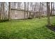 Stone house with a well-maintained lawn and lush greenery at 5918 Camelback Ct, Indianapolis, IN 46250