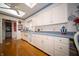 Spacious kitchen with custom cabinetry, hardwood floors, and a unique design at 5918 Camelback Ct, Indianapolis, IN 46250