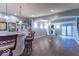 Finished basement area with a full bar, accent lighting, and views to a fireplace area at 633 Foxboro Dr, Avon, IN 46123