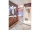 Beautiful bathroom with glass block shower, soaking tub, and double vanities at 633 Foxboro Dr, Avon, IN 46123