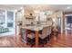 Well-appointed kitchen featuring a wine cooler, ample seating, and seamless flow to the living area at 633 Foxboro Dr, Avon, IN 46123