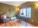 Inviting home office with hardwood floors, ample natural light, and comfortable seating at 633 Foxboro Dr, Avon, IN 46123