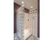 Modern bathroom boasts a glass block shower enclosure for natural light and privacy at 633 Foxboro Dr, Avon, IN 46123