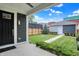 Beautifully landscaped backyard with lush greenery and a charming patio area at 634 Dorman St, Indianapolis, IN 46202