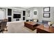 Cozy finished basement living area has a comfortable sofa and stylish decor at 634 Dorman St, Indianapolis, IN 46202