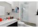 Modern bathroom featuring a sleek vanity, and a glass-enclosed shower at 634 Dorman St, Indianapolis, IN 46202