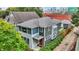 Charming two-story home with fresh paint, blooming flowers and an inviting exterior at 634 Dorman St, Indianapolis, IN 46202