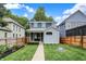 Charming two-story home with a well-manicured front yard and inviting curb appeal at 634 Dorman St, Indianapolis, IN 46202