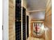 Custom wine cellar with wooden shelving and racks at 634 Dorman St, Indianapolis, IN 46202