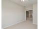 This bedroom has neutral walls, a ceiling fan, and light carpet at 6997 Harbour Woods Overlook, Noblesville, IN 46062