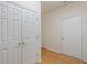 Hallway view with multiple doors leading to closets, and rooms throughout the house, offering easy access at 6997 Harbour Woods Overlook, Noblesville, IN 46062