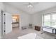 Neutral guest bedroom features an abundance of natural light at 7208 Long Boat Dr, Indianapolis, IN 46250