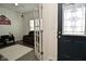 Welcoming entryway with glass paneled french doors leading to living space at 7527 Derek Dr, Camby, IN 46113