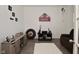Cozy living room featuring modern flooring, neutral colors, and stylish decor at 7527 Derek Dr, Camby, IN 46113
