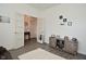 Open floor plan showcasing the living room with french doors and stylish decor at 7527 Derek Dr, Camby, IN 46113