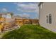 Landscaped backyard featuring a well-maintained lawn and privacy fence, perfect for outdoor relaxation and entertaining at 768 Pine Lake Dr, Greenwood, IN 46143