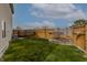Spacious backyard with green grass and wooden fence, great for Gathering activities and outdoor enjoyment at 768 Pine Lake Dr, Greenwood, IN 46143