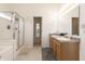 Bathroom featuring a glass enclosed shower and double sink vanity at 768 Pine Lake Dr, Greenwood, IN 46143