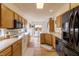 Modern kitchen with wood cabinets, stainless appliances, and laminate countertops at 768 Pine Lake Dr, Greenwood, IN 46143