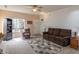 Comfortable living room featuring a fireplace, closet and nice furniture at 768 Pine Lake Dr, Greenwood, IN 46143