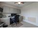 Home office with built in shelving and a ceiling fan at 768 Pine Lake Dr, Greenwood, IN 46143