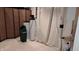 Utility area with water system, storage shelves, and equipment, ensuring functionality and organization at 7809 Bryden Dr, Fishers, IN 46038