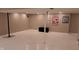Spacious basement with white floors and recessed lighting, ready for customization and entertainment at 7809 Bryden Dr, Fishers, IN 46038