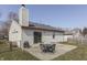 Cozy backyard with a patio, perfect for outdoor dining and entertaining at 855 Queensgate Dr, Greenwood, IN 46143