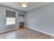 Bedroom with wood floors, neutral paint and a large window at 855 Queensgate Dr, Greenwood, IN 46143