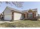 Charming home with brick and siding, attached garage, and well-maintained lawn at 855 Queensgate Dr, Greenwood, IN 46143