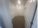 Walk-in closet with shelving and carpet flooring at 8727 Duncan St, Fortville, IN 46040