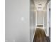 Long hallway leading to bedrooms and living area at 8807 Wintergreen Way, Indianapolis, IN 46256