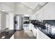 Well-lit kitchen featuring stainless steel appliances and granite countertops at 8807 Wintergreen Way, Indianapolis, IN 46256