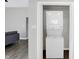 Conveniently located laundry closet with a stackable washer and dryer unit at 8807 Wintergreen Way, Indianapolis, IN 46256