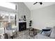 Cozy living room with plenty of natural light and vaulted ceilings at 8807 Wintergreen Way, Indianapolis, IN 46256