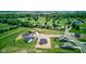 Aerial view of a new home in an expansive neighborhood with a large lawn at 9182 Mulligan Ct, Elwood, IN 46036
