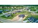 Aerial view of a new home, driveway, and neighborhood at 9182 Mulligan Ct, Elwood, IN 46036