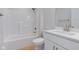 A clean white bathroom with a shower/tub combination and a vanity sink at 9182 Mulligan Ct, Elwood, IN 46036