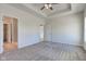 Bright, airy main bedroom featuring neutral carpets and trey ceilings at 9182 Mulligan Ct, Elwood, IN 46036