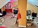 Untidy attic with college decor and a closet at 921 W Carson St, Muncie, IN 47303