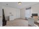 Bright bedroom with ample space, a sleek desk, and modern decor, creating a stylish and inviting space at 10221 Tournon Dr, Fishers, IN 46037