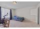 Well-lit bedroom featuring a comfortable bed and exercise bike, perfect for relaxing and staying active at 10221 Tournon Dr, Fishers, IN 46037