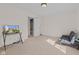 Relaxing bedroom featuring a modern TV setup and a comfortable futon, creating a cozy and inviting space at 10221 Tournon Dr, Fishers, IN 46037