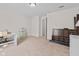 Large bedroom featuring a functional desk, minimalist decor, and an open layout for versatile use at 10221 Tournon Dr, Fishers, IN 46037