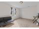 Bright and airy bedroom with a comfortable futon, offering a cozy space for relaxing and unwinding at 10221 Tournon Dr, Fishers, IN 46037