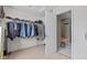 Walk-in closet that leads into a bathroom at 10221 Tournon Dr, Fishers, IN 46037