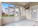 Enclosed porch with sliding door and boat decor, perfect for relaxation at 10221 Tournon Dr, Fishers, IN 46037