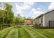 Spacious backyard with patio, grill, and lawn, enclosed by a fence for privacy and recreation at 1024 Cyprian Way, Lebanon, IN 46052