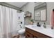 Bathroom with a shower-tub combo, modern vanity, and neutral wall paint at 1024 Cyprian Way, Lebanon, IN 46052