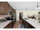 Modern kitchen with wood cabinets, stainless steel appliances, and an island at 1024 Cyprian Way, Lebanon, IN 46052